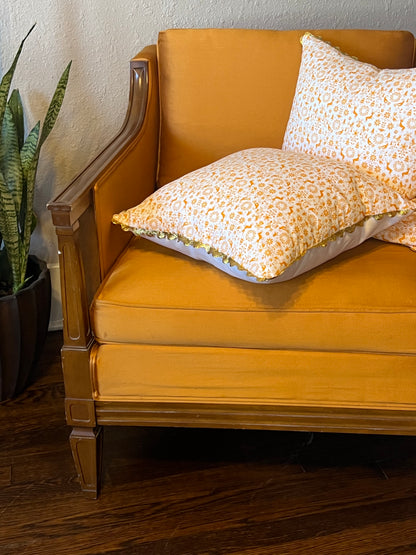 Orange You Glad it's Christmas Pillow with gold rickrack